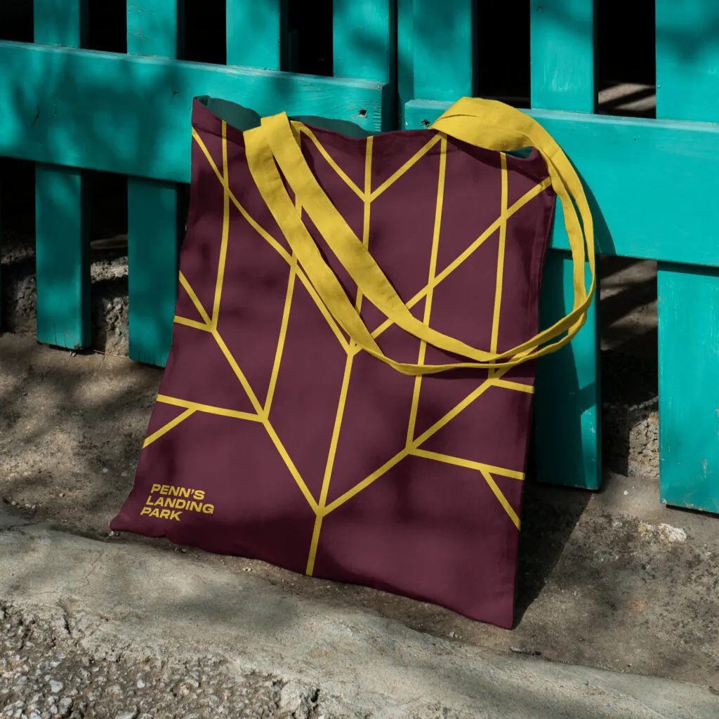 Tote bag design with large logo covering the bag