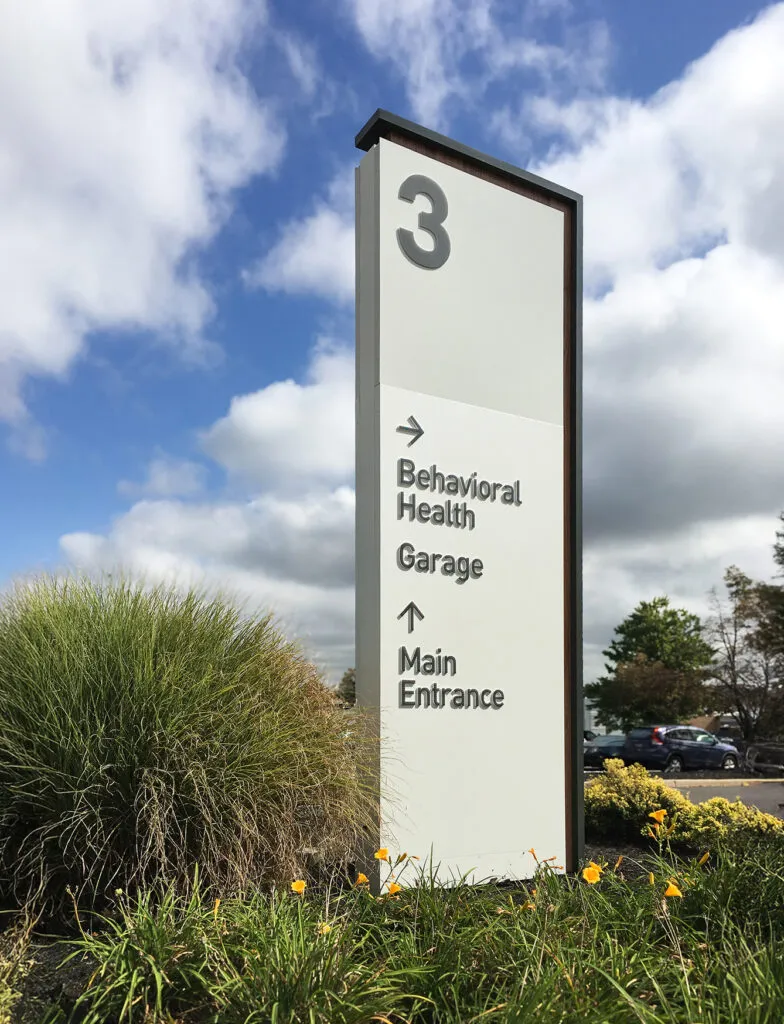 Outdoor vehicular directional sign.