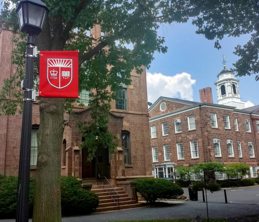 Rutgers branding on lampost flag