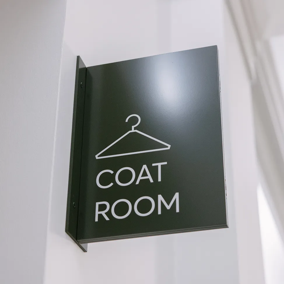 Coat room flag sign