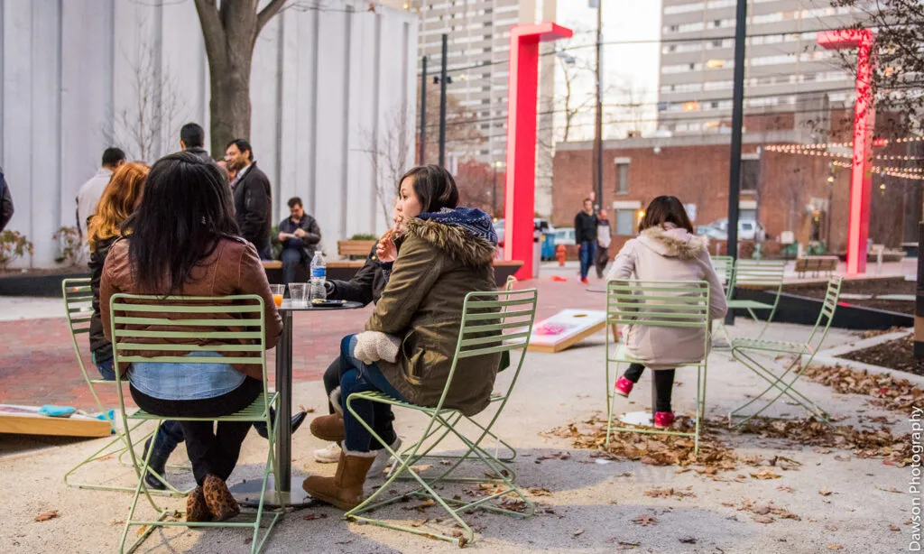 People sitting at tables and eating