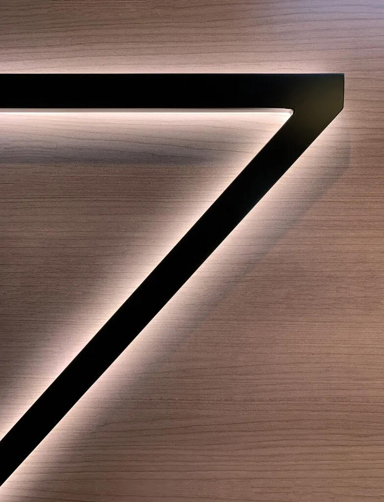 SSMHealth Fish Hatchery Level 7 close up of dimensional 7 with halo lighting