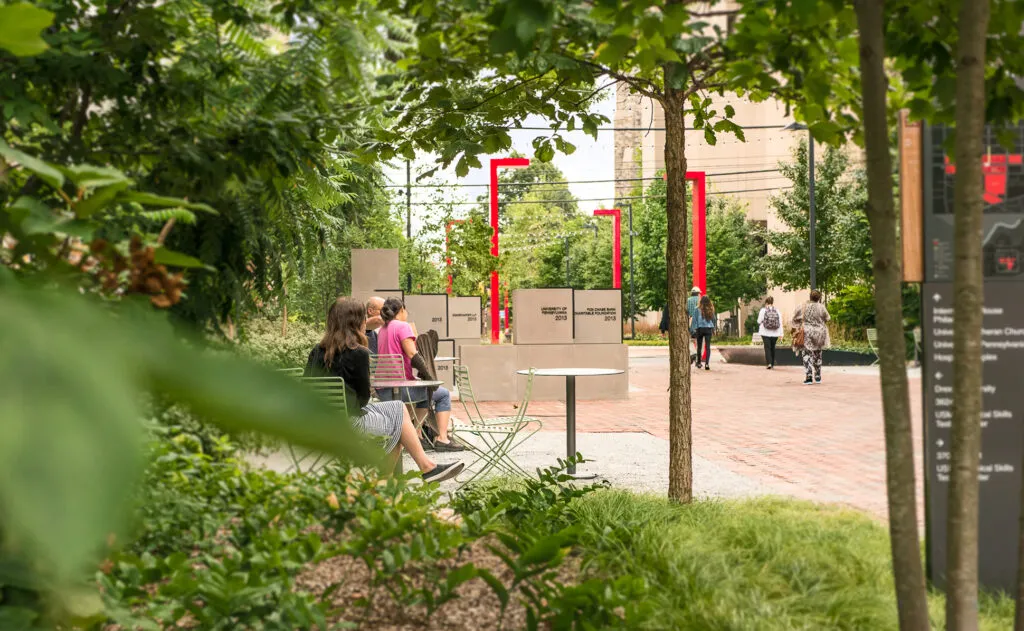 Pillars shot through landscaping