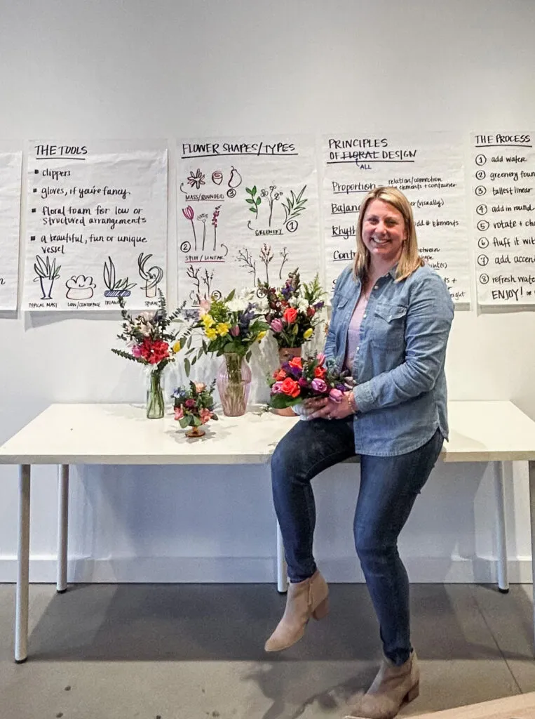 Kelly giving a flower arranging tutorial